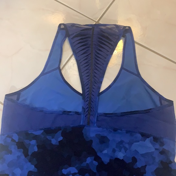 Lululemon racerback tank, delicate design down the back with reflective strip. - Picture 2 of 4